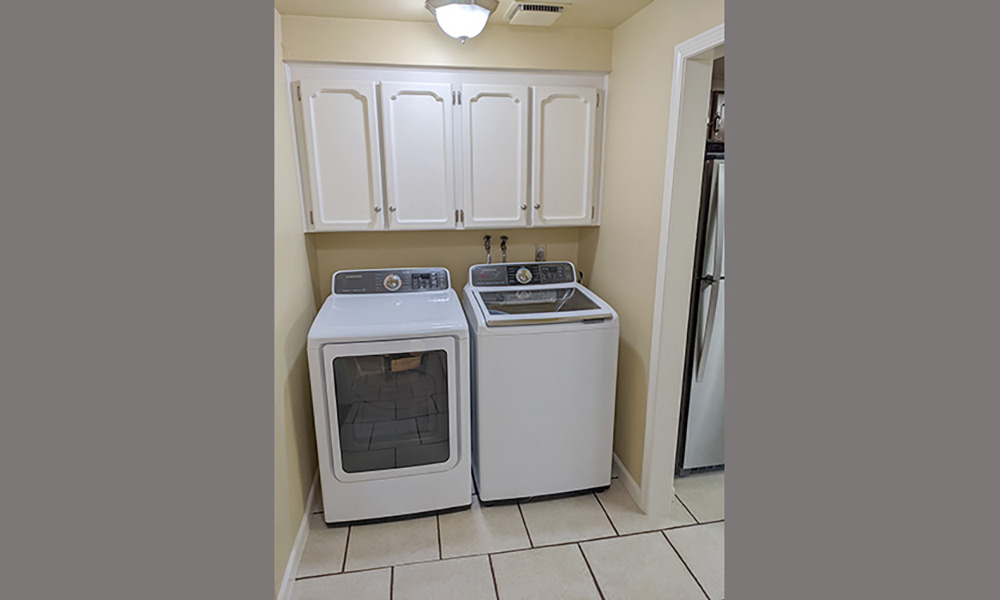 Laundry Room Appliance and Cabinet Area